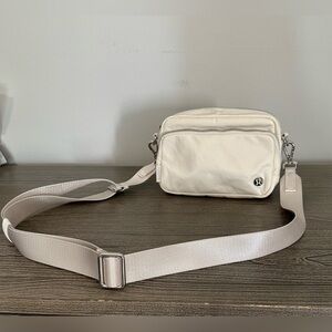 lululemon Everywhere Crossbody Bag. Color: Bone with Silver Hardware. Like-New!